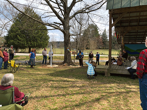 Hermina Glass-Hill of the Susie King Taylor Women's Ecology Institute in Midway, Georgia, conducted a libation ceremony for purification and healing at the Peace Pole dedication on March 13, 2021.