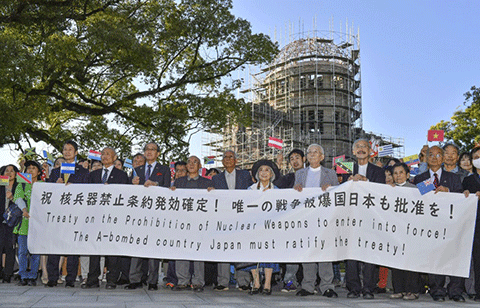 Japanese activists protested to encourage Japan to sign the U.N. Treaty on the Prohibition of Nuclear Weapons the day after it was fully ratified and became international law.